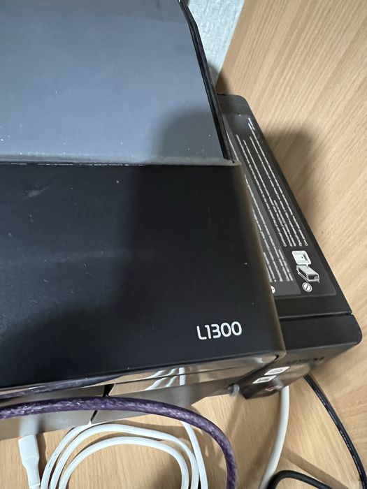 Продам принтер Epson l1300. Печатает хорошо, заправлена
