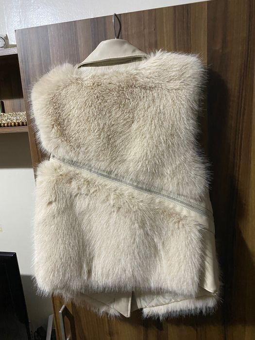 Дамски пухен елек