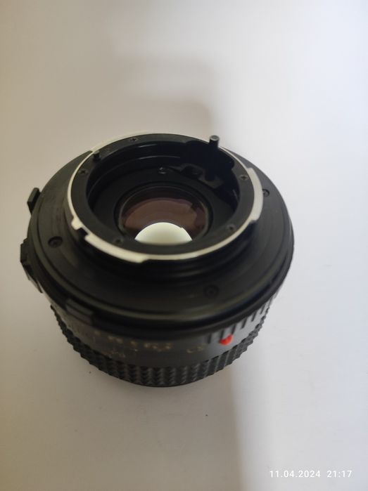 Объектив для камеры Minolta