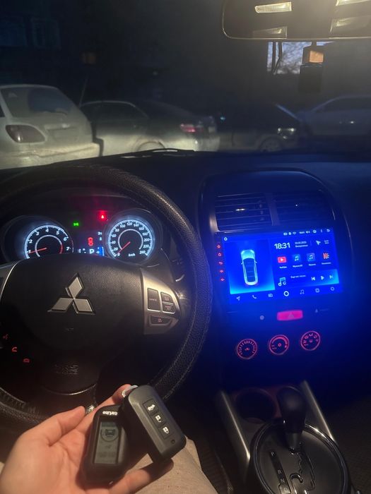 Митсубиси asx 2011 года