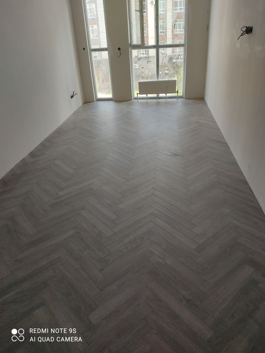 Укладка ламината и  паркета