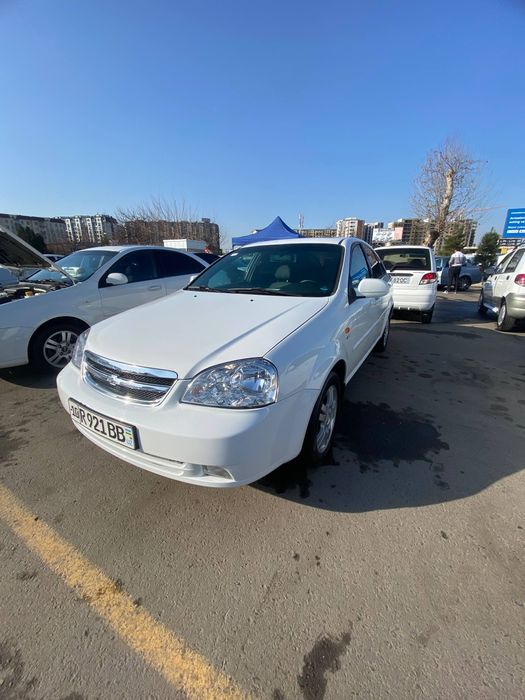 Ласетти 2013.   1.6 матор  пробег 174000 вариантам  бор!!!