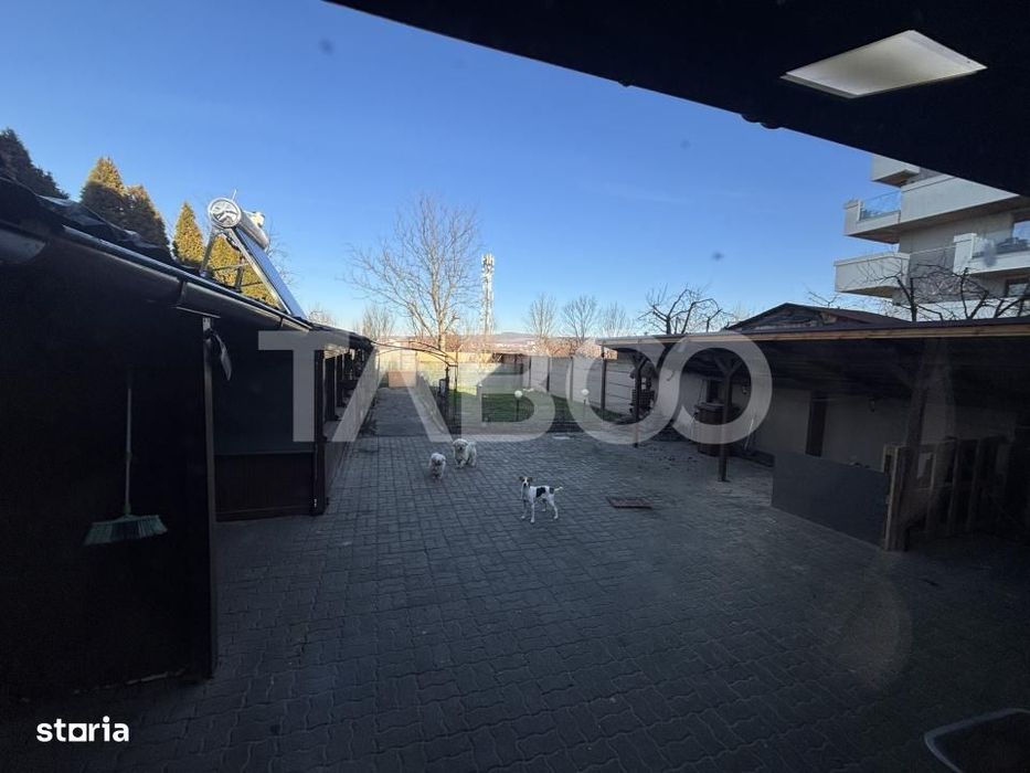 Casa individuala cu 5 camere +spatiu comercial  3 bai Sibiu