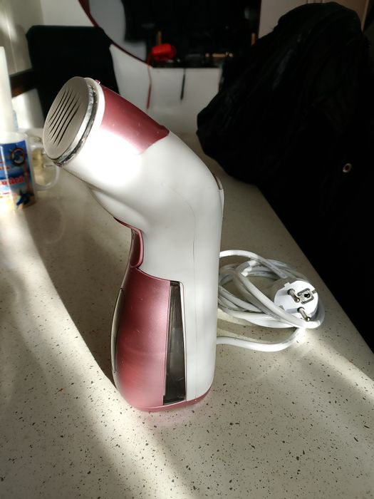 Mașina de călcat vertical cu abur