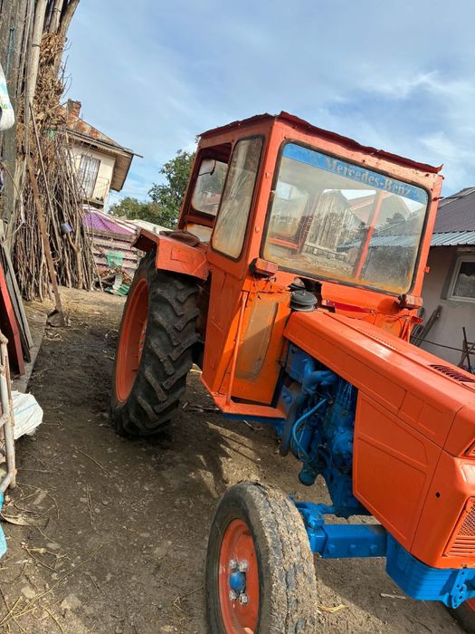 Vand tractor cu cositoare cositoare si plug
