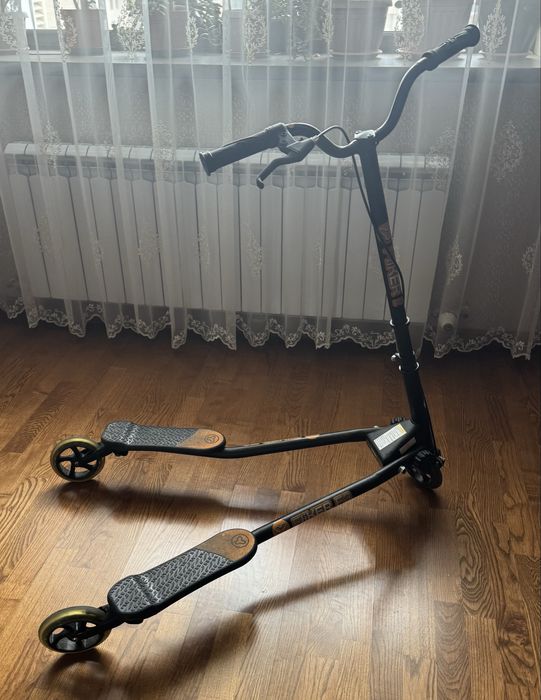 Инерционный самокат