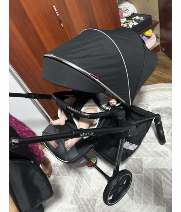 New lux коляска