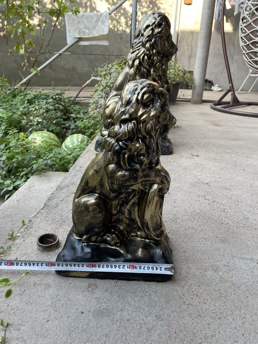 Статуэтка льва..