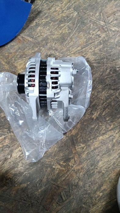 Генератор на Мазду Кронос 626