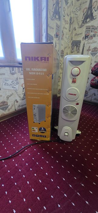 Масляный обогреватель NIKAI QOVURGʻALI ISITGICH