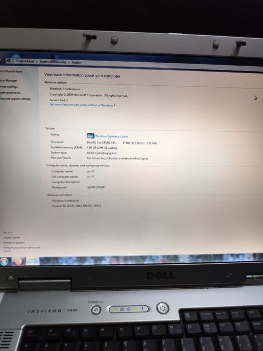 Laptop dell 9400 culoare alb.