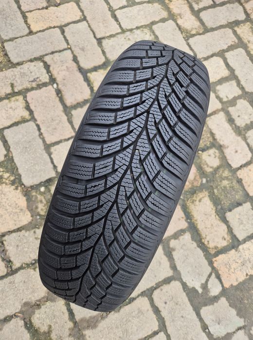 O bucată 185/65 R15 M+S iarnă - una Continental Semperit