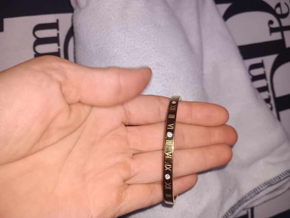 Vand doua bratari litera roamna