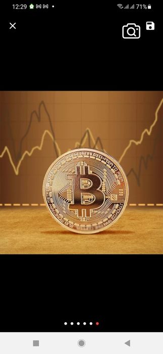 Позлатена биткоин монета