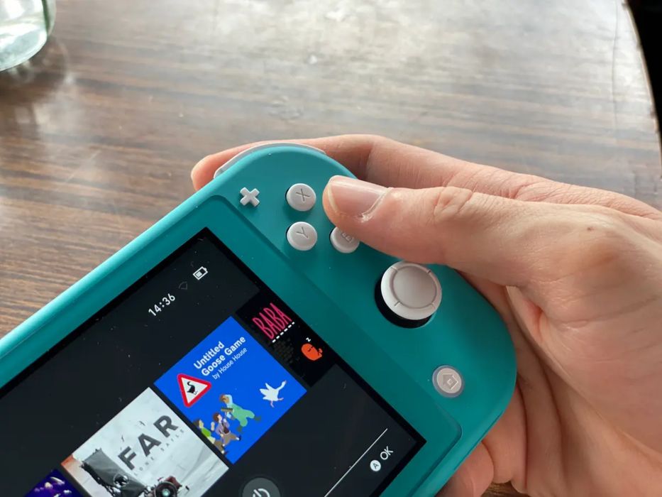 Nintendo Switch Lite Turcoaz - stare impecabilă