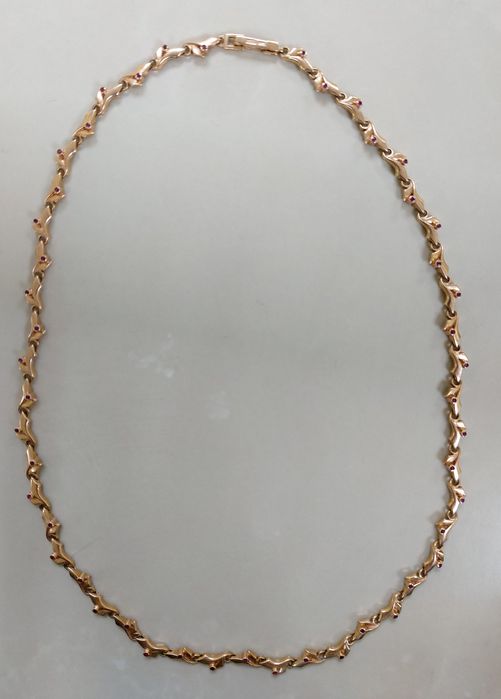 Золотое колье с рубинами