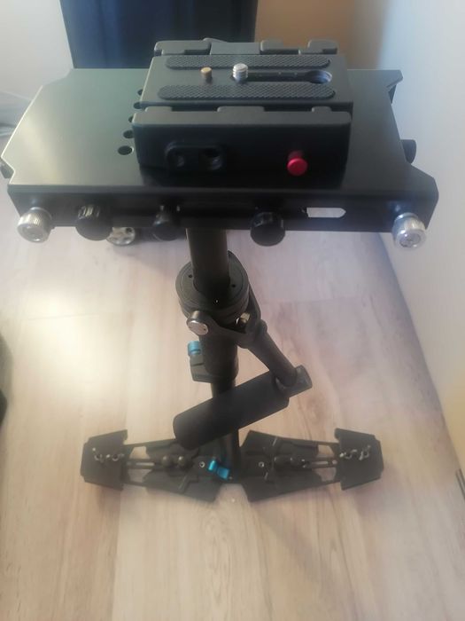 Sistem Vesta cu brat stabilizat