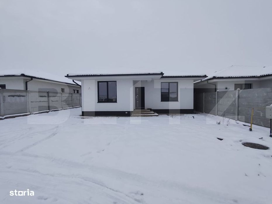 Casa finisata la cheie racordata la toate utilitatile in Santandrei