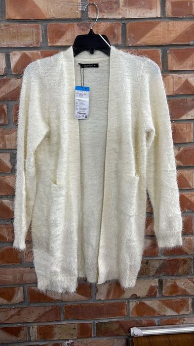 Женские свитеры и кофты