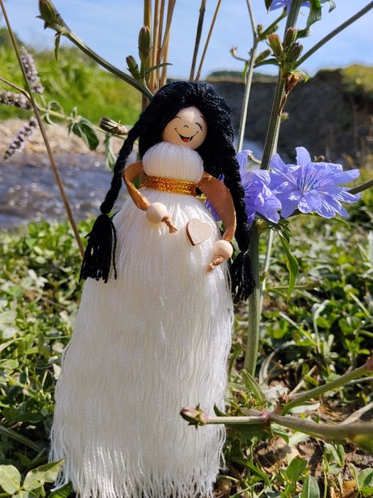 Păpușa “Mămica cu zâmbet” – Simbol al vieții și iubirii