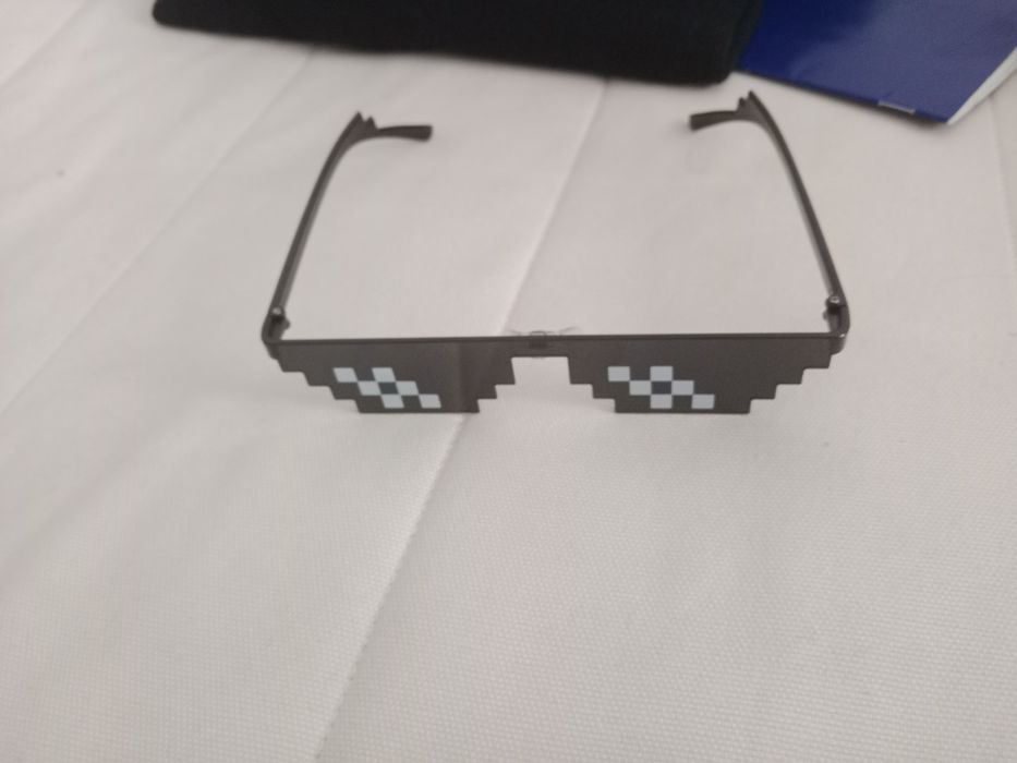 Очки солнцезащитные местные их 2013