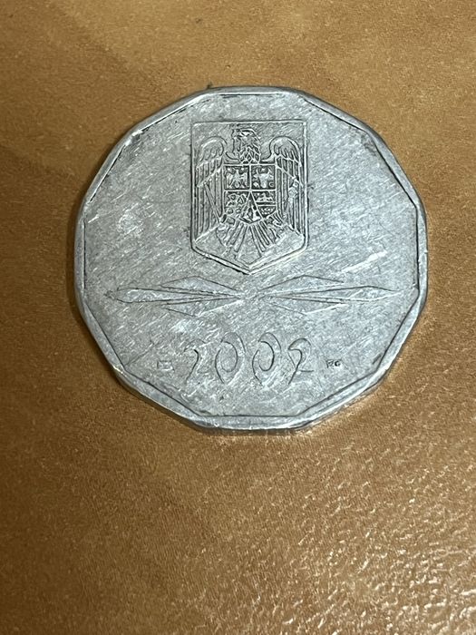 Vand moneda 5000 lei
