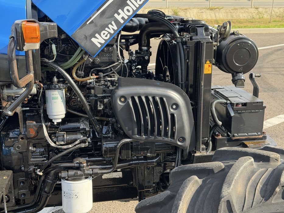 Tractor New Holland TN 55 An 2006 ore 547 ca NOU import Danemarca Claas Case John Deere Fendt Same Deutz Fiat 70 90 Fiat 80 90 Fiat 640 Fiat 550