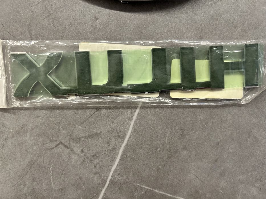 Знак тойота hilux