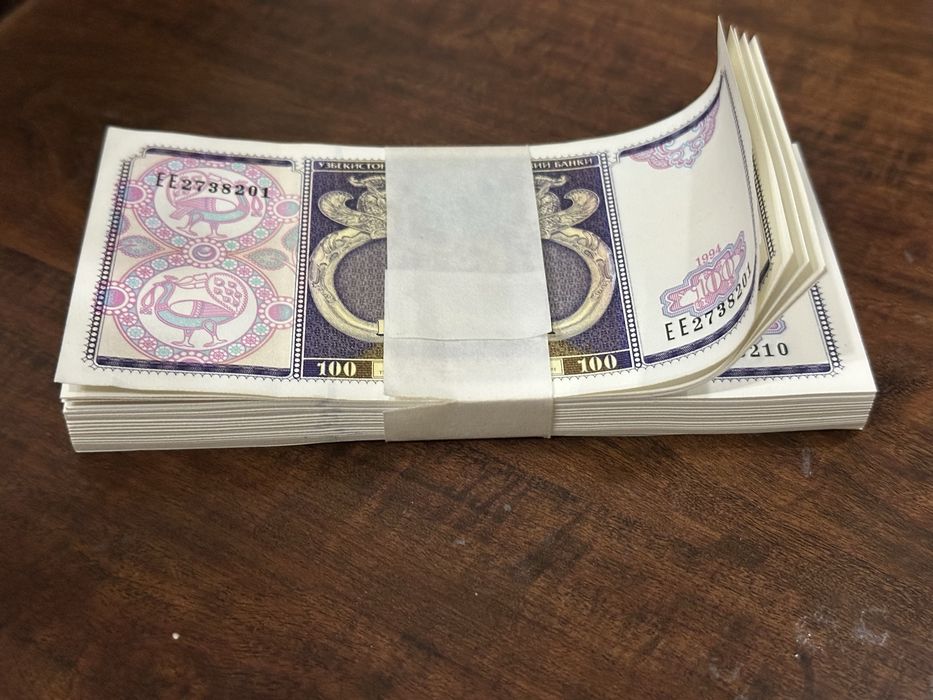 Бузилмаган бир пачка 100 сумлик