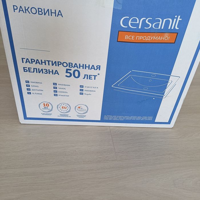 Продам раковину с тумбой