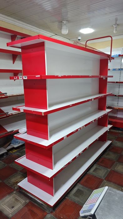 Срочно продаётся двухсторонний стеллаж, (полка)