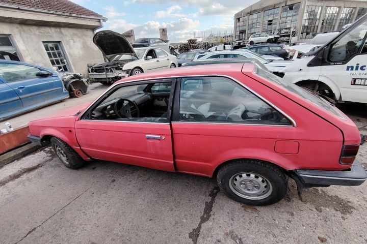 Aripa fata stanga Mazda 323 1985