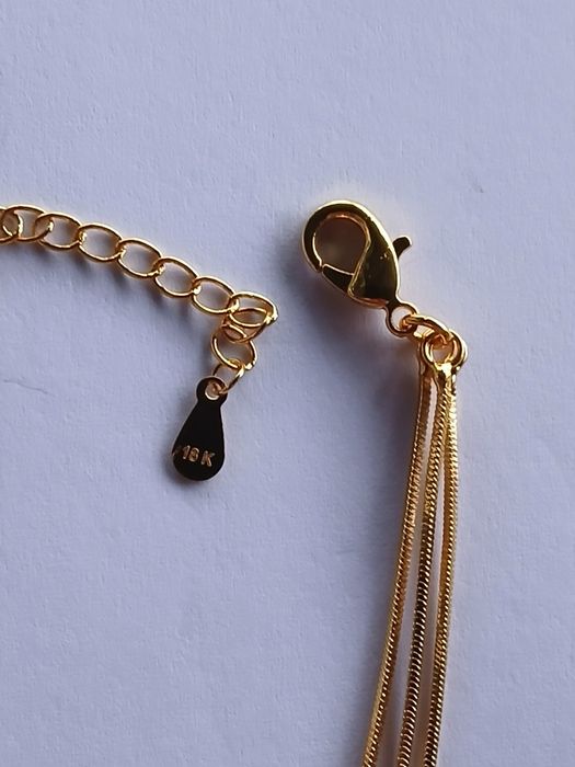 Brățară de dama ,plăcută cu aur 18k