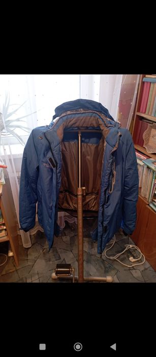 Продам пуховик женский