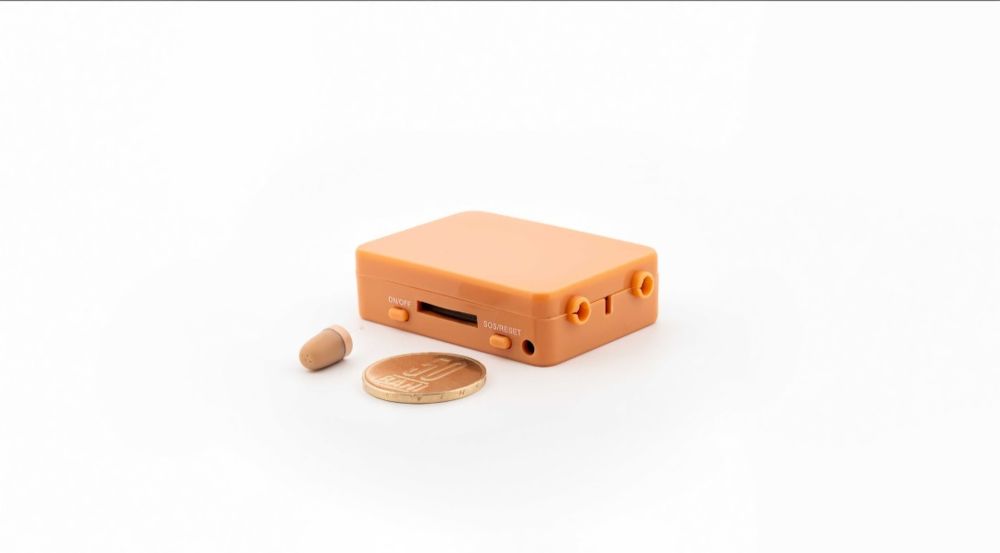 Cutiuta GSM cu Casca de Copiat fara Fire RM-200