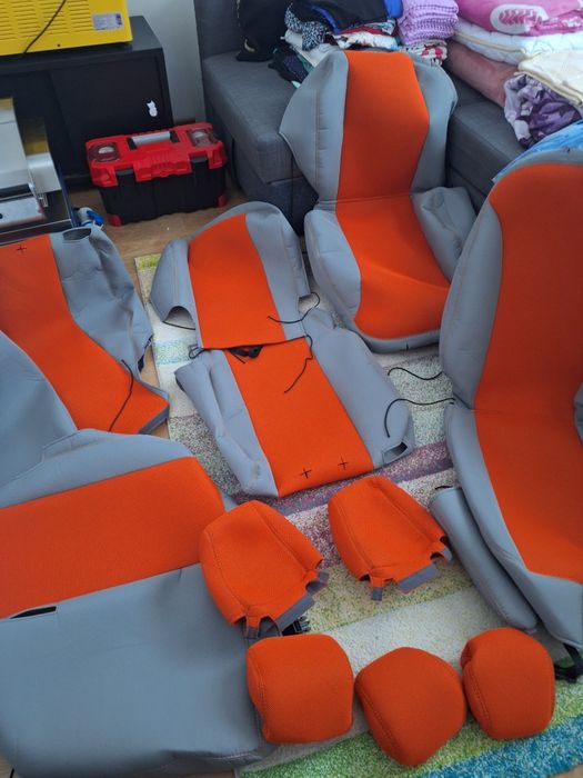 Huse dedicate Ford Kuga 2 făcute pe comandă  pe  Huse.Ro  din material premium gros, plăcut la atingere,,cusături portocalii, noi   Pret fix 400 lei!