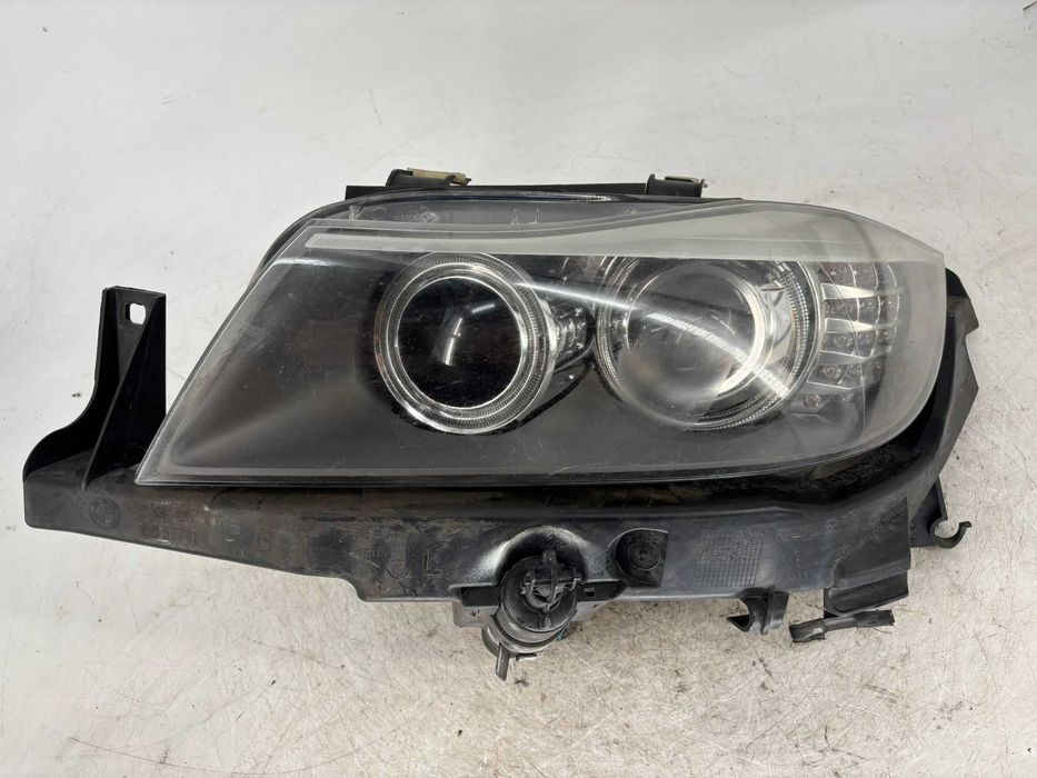Far stanga Bmw seria 3 E90 an 2009