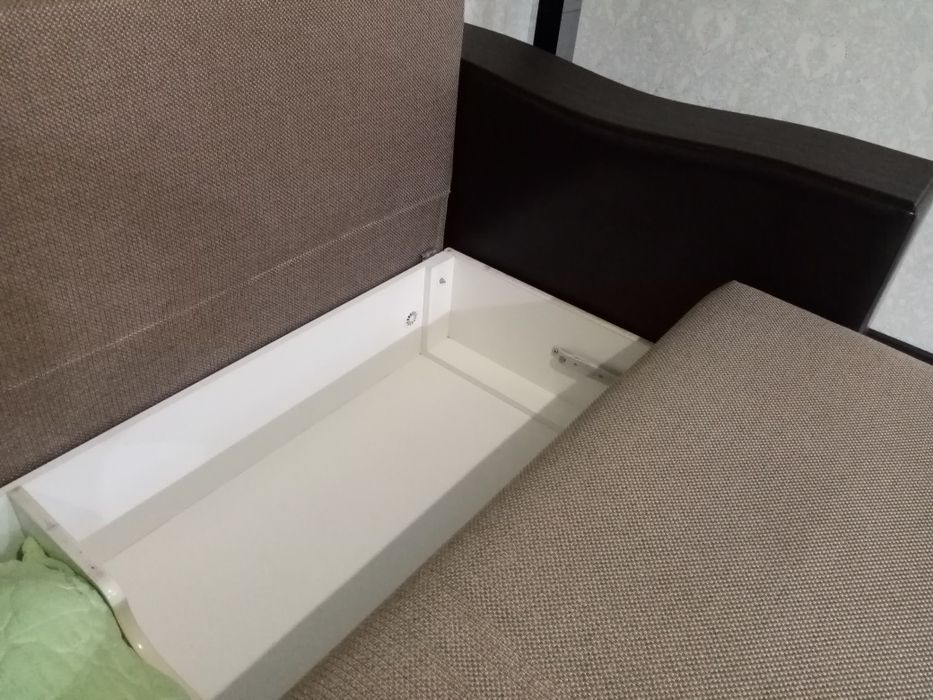 Диван Мягков коричневого цвета