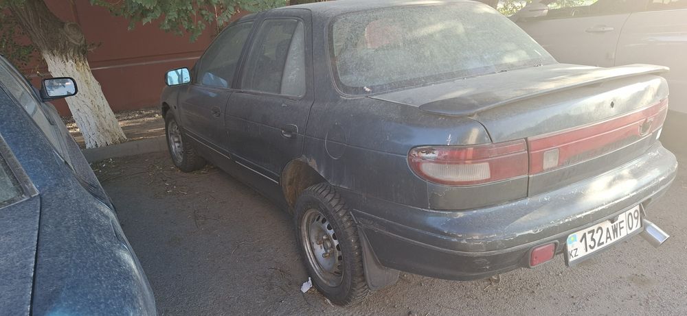 Автомобиль kia sefira