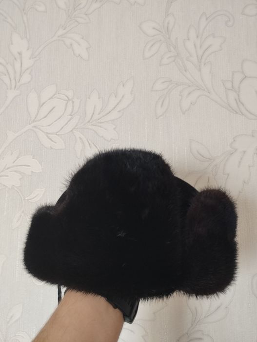 Продам норкавый шапку