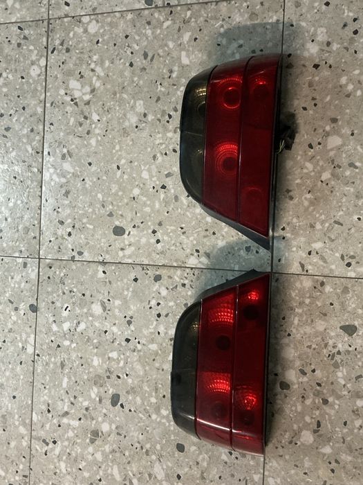 Задние фонари е38