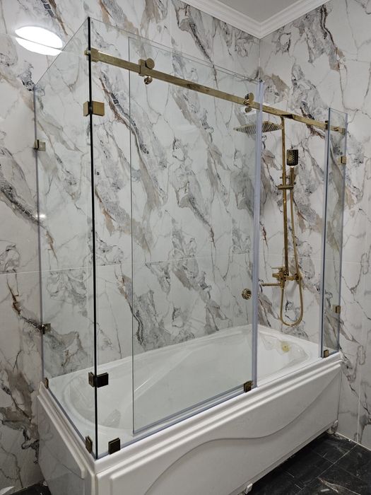 Стеклянные шторки на ванну