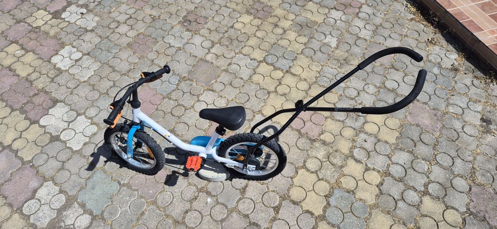 Vand bicicleta BTWIN  pt. copii cu roti ajutatoare