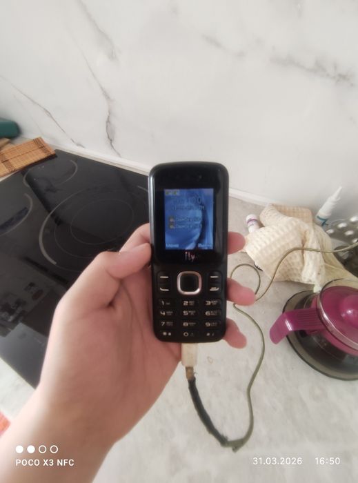 Продам кнопочный телефон fly