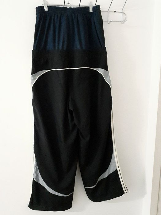 balenciaga cut up track pants