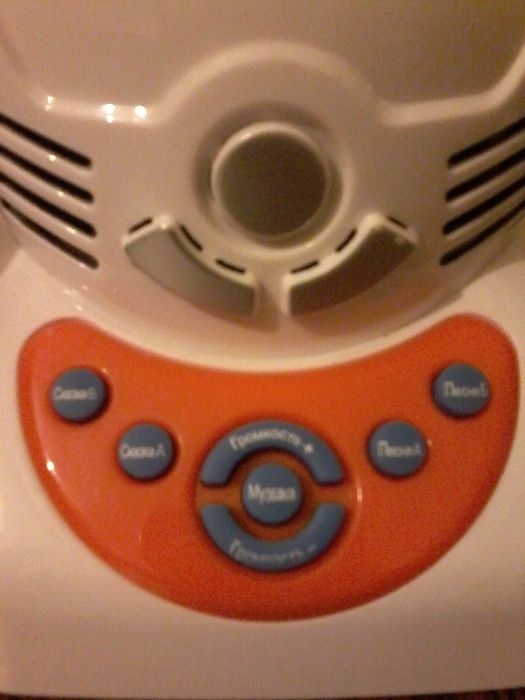 Игрушка робот поёт детские песни и рассказывает сказки