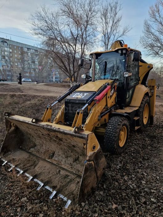 Камаз и Экскаватор погрузчик