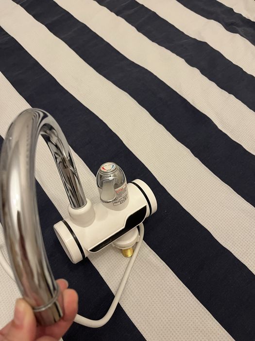 Продаю проточный кран водонагреватель