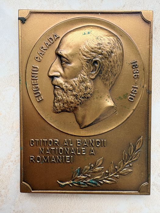 Vând plachetă aniversară din bronz, emisă de Banca Națională a României în anul 1995, cu ocazia împlinirii a 115 ani de la înființarea instituției.