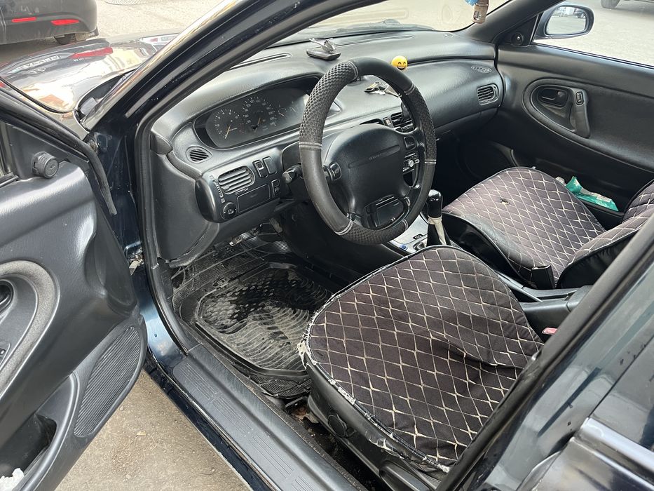 Машина мазда кроносс